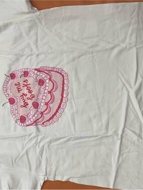 Out of Print White Tee with Pink Cake Graphic